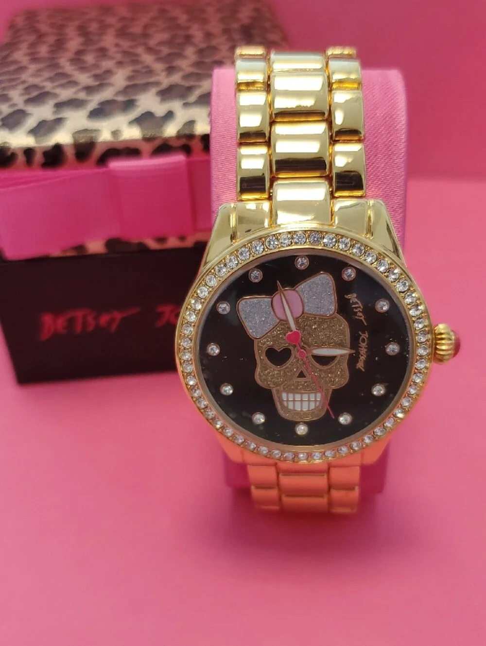 Betsey Johnson Gold-Tone Watch with Black Dial and Pink Bow Accent